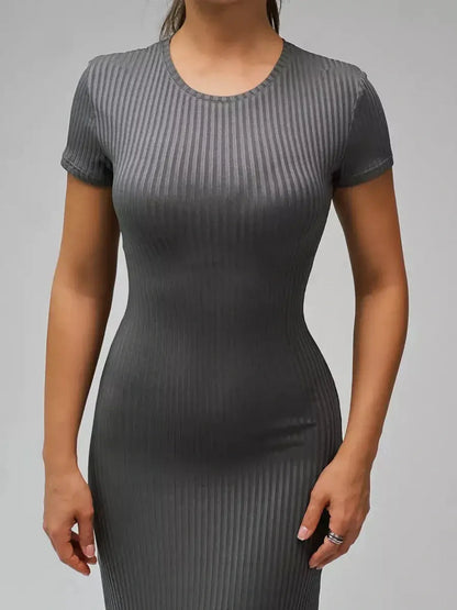Shadow Curve Maxi Dress in gray, showcasing a sleek ribbed design and flattering figure-hugging fit for women's occasions.