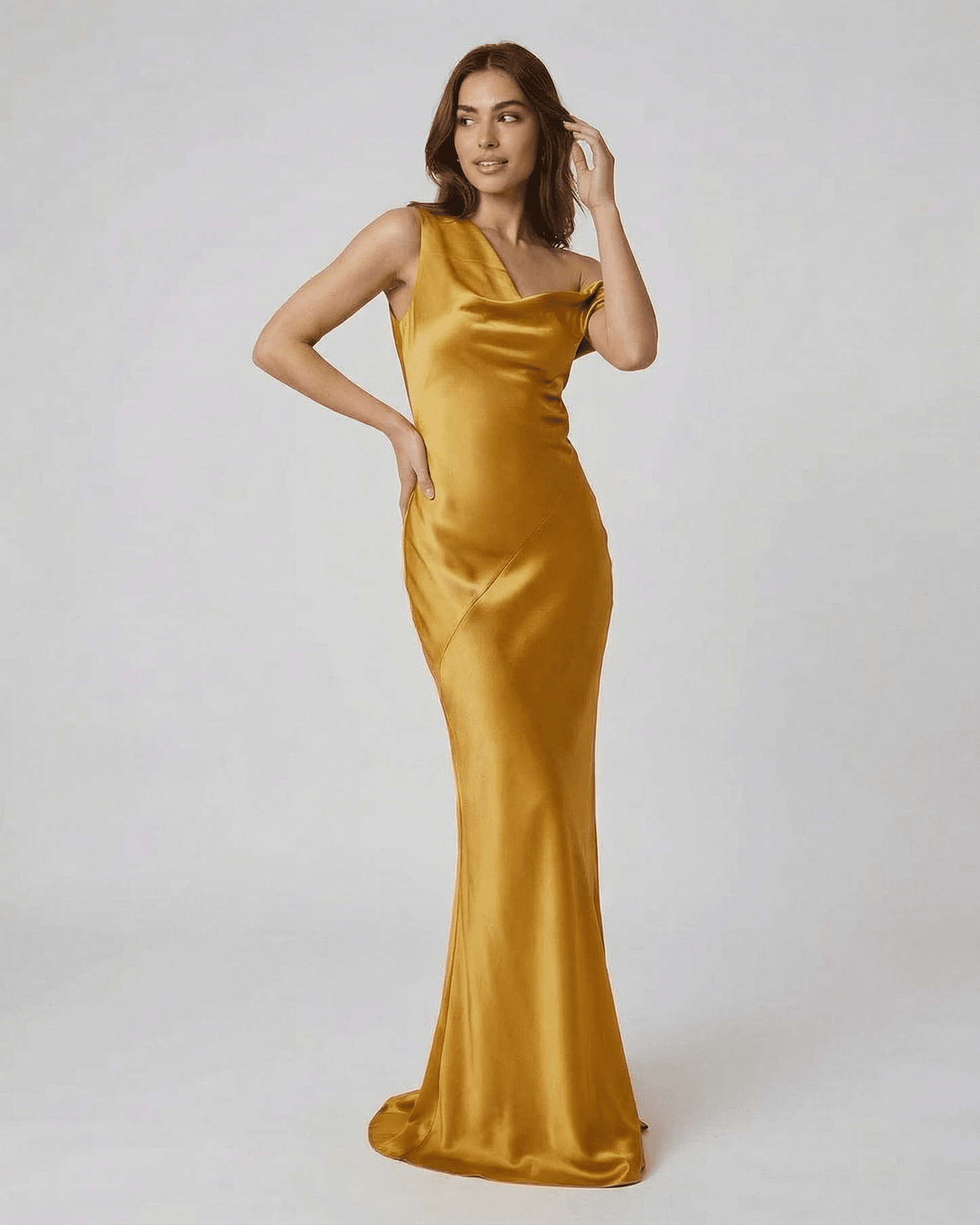 Aurelia Maxi Dress: Slimona gold satin maxi dress featuring a high waist and open back, showcasing an elegant silhouette.