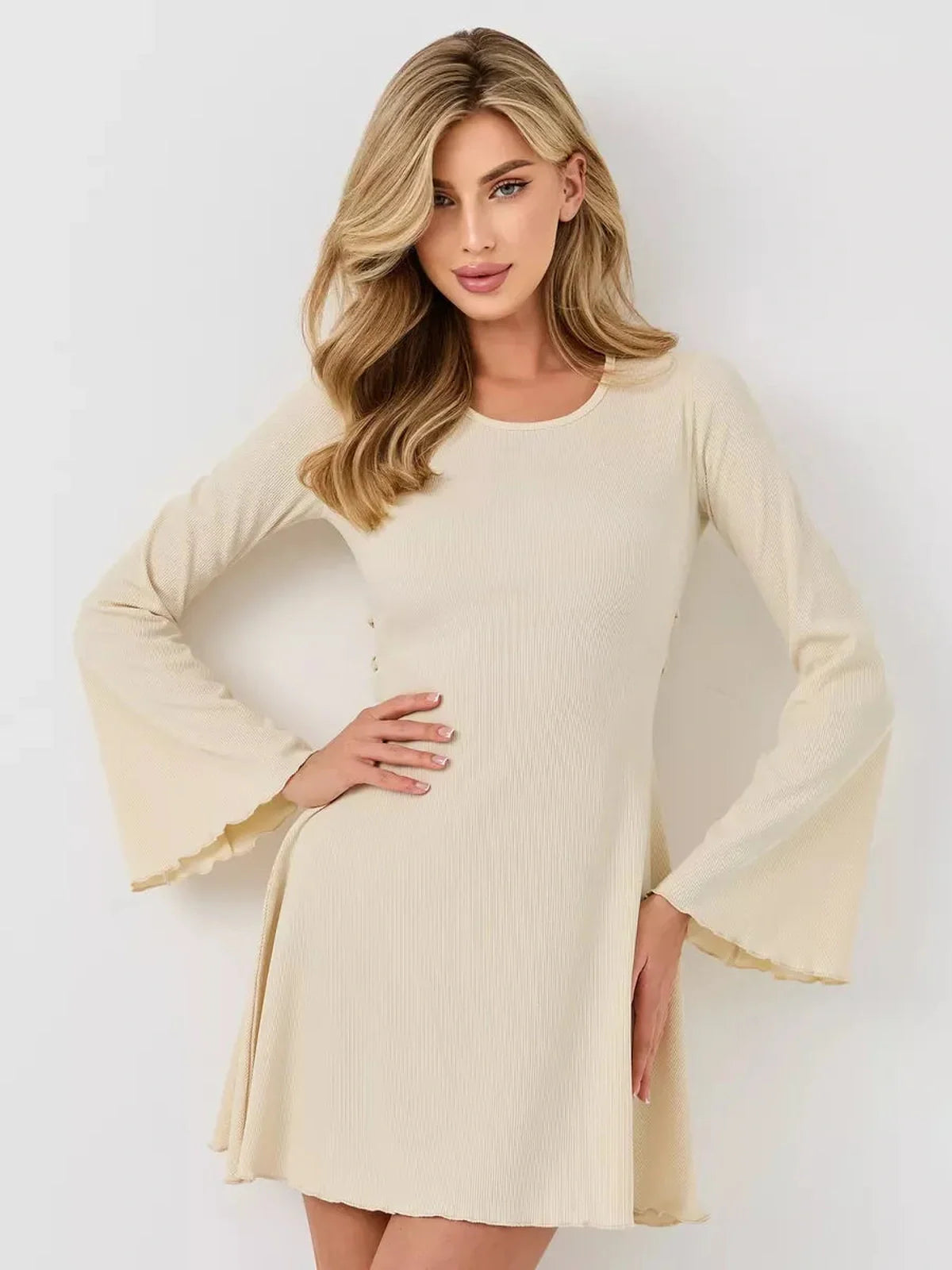 Ivory Flare mini dress with long flared sleeves, perfect for weddings, parties, or casual outings.