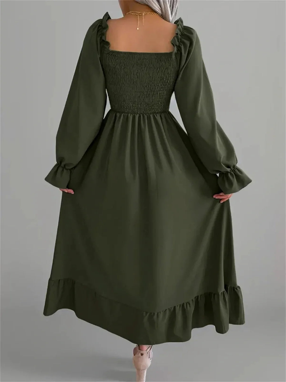 Ruffle Charm Midi Dress in olive green with long sleeves and a smocked bodice, perfect for weddings and casual outings.