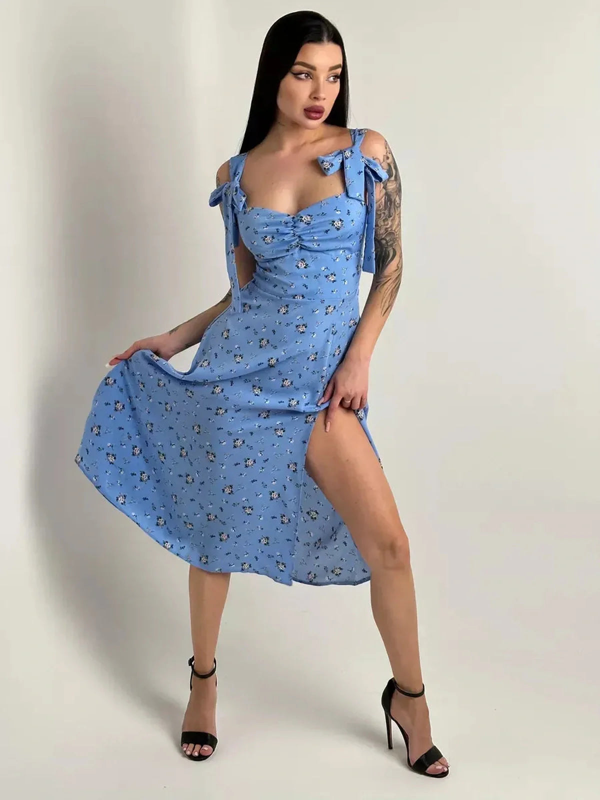 Stylish Floral Charm Midi Dress in blue with shoulder ties and side slit, perfect for summer weddings and formal occasions.
