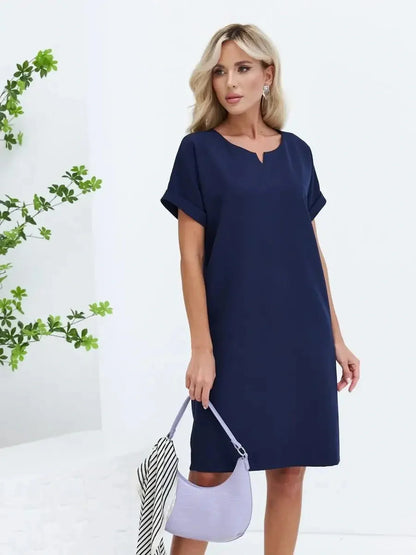 Navy Line mini dress featuring a structured silhouette, perfect for summer events and casual outings.