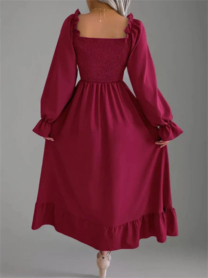 Back view of the Velina Midi Dress in burgundy, featuring a square neck and ruffled hemline, perfect for summer events and formal occasions.