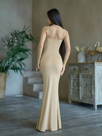 Back view of the Sculpted Elegance Maxi Dress showcasing its body-hugging fit and sleek minimalist design.