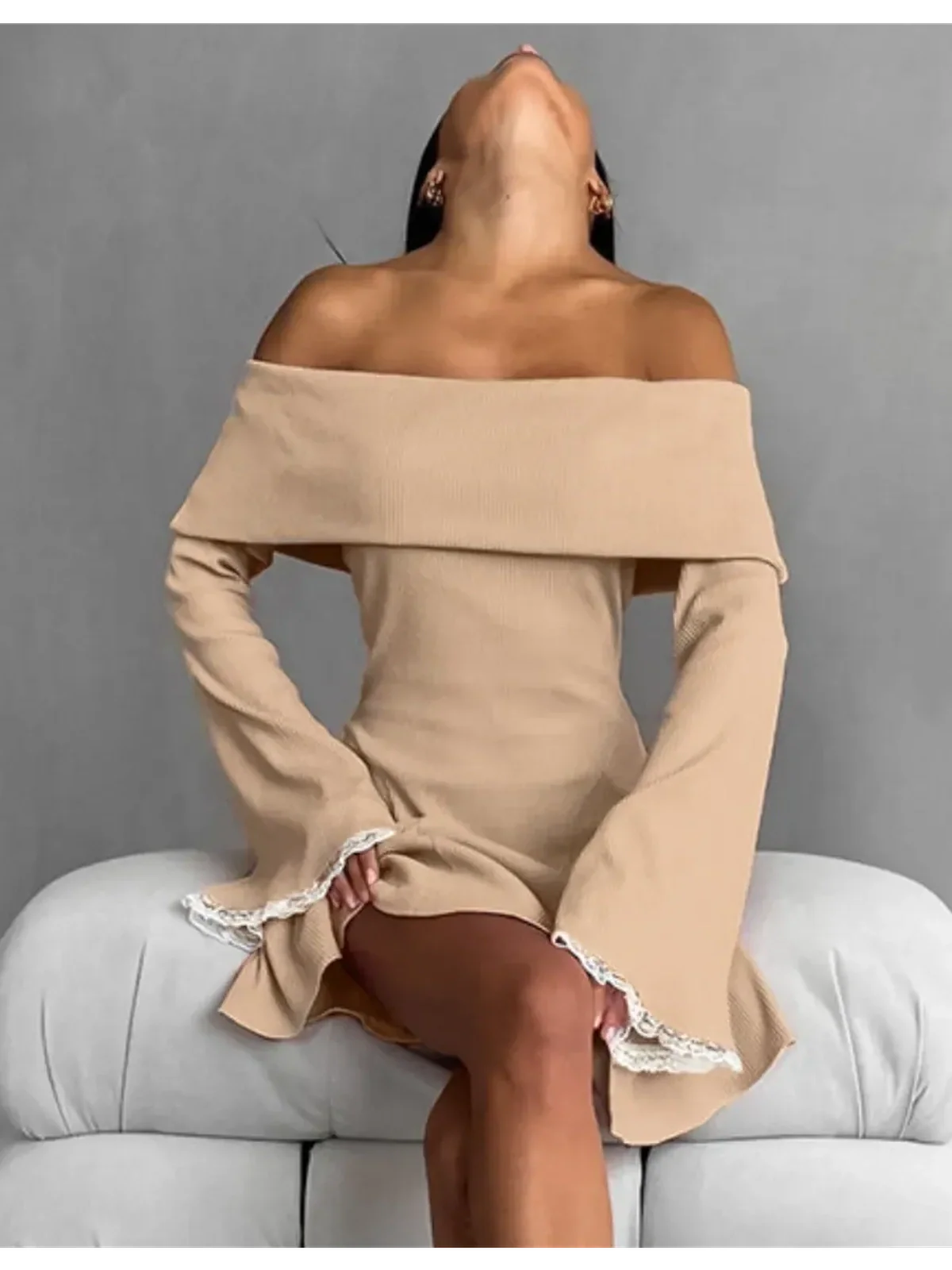 Muse Mini Dress in beige, featuring an off-shoulder silhouette with bell sleeves and lace trim, ideal for summer or casual occasions.