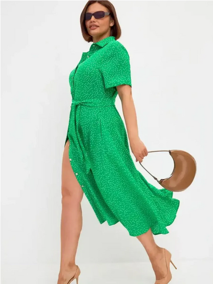 Bright green midi dress with white dots, button-down style, tie waist, ideal for summer and wedding guest attire.