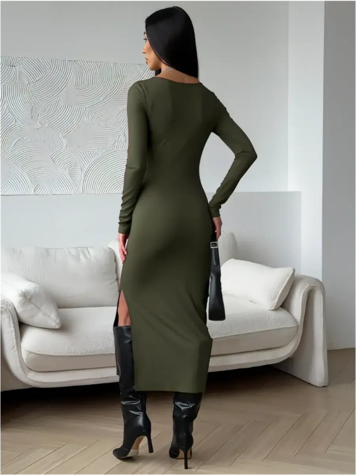 Rear view of a woman in a khaki Verona Midi Dress with a side slit, showcasing elegance and style.
