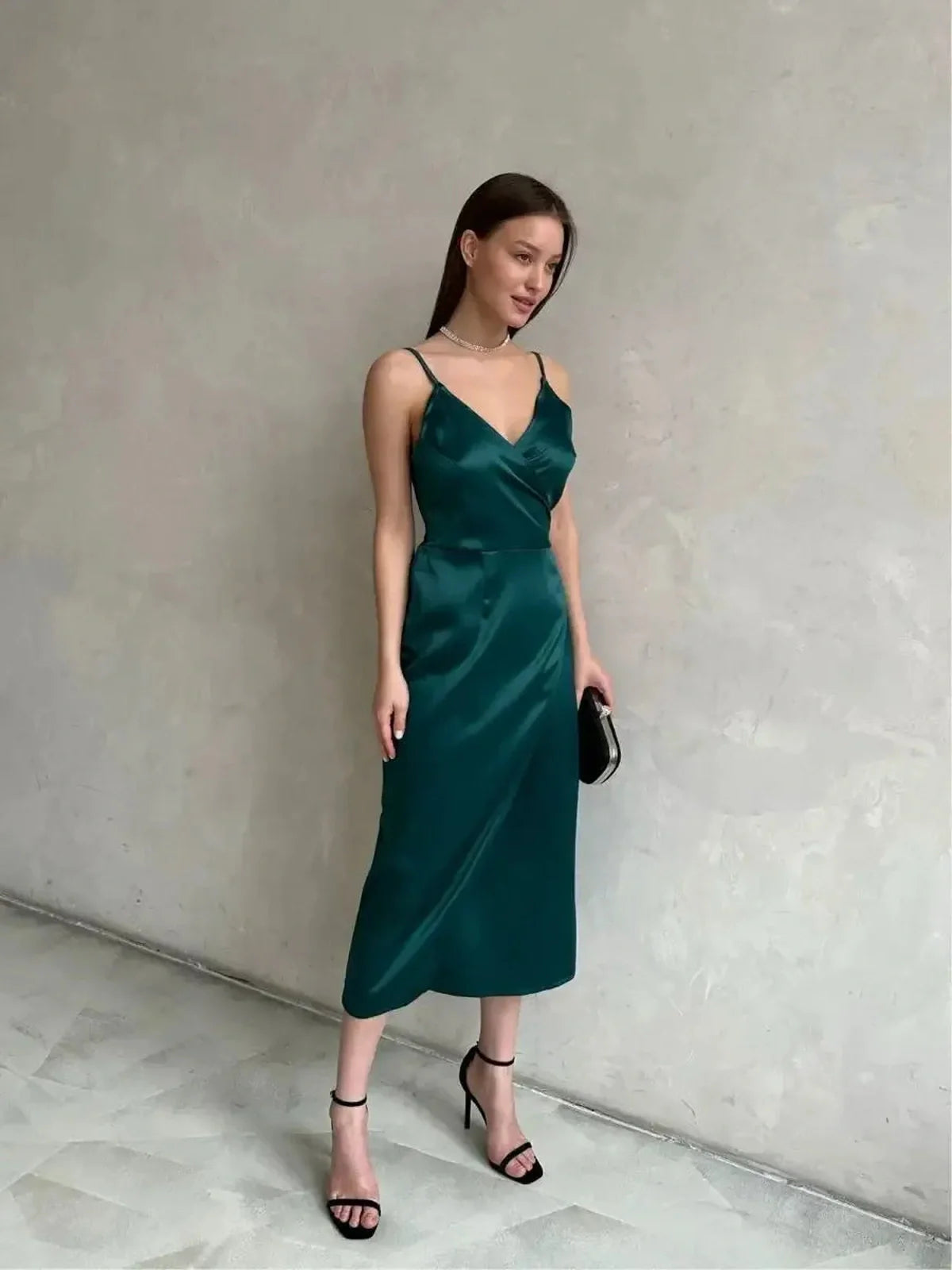 Emerald wrap midi dress in satin, perfect for weddings, parties, and formal occasions, showcasing elegance and sophistication.