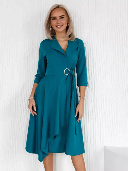 Sea Grace Midi Dress in sea wave teal featuring a tailored wrap style and elegant flow, perfect for weddings or cocktail events.