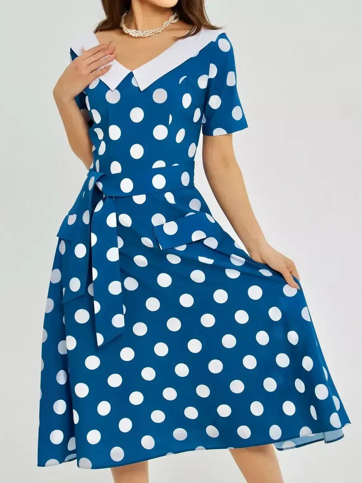 Pearl Dot Midi Dress in dark teal with white polka dots and collar, perfect for summer, weddings, or cocktail events.