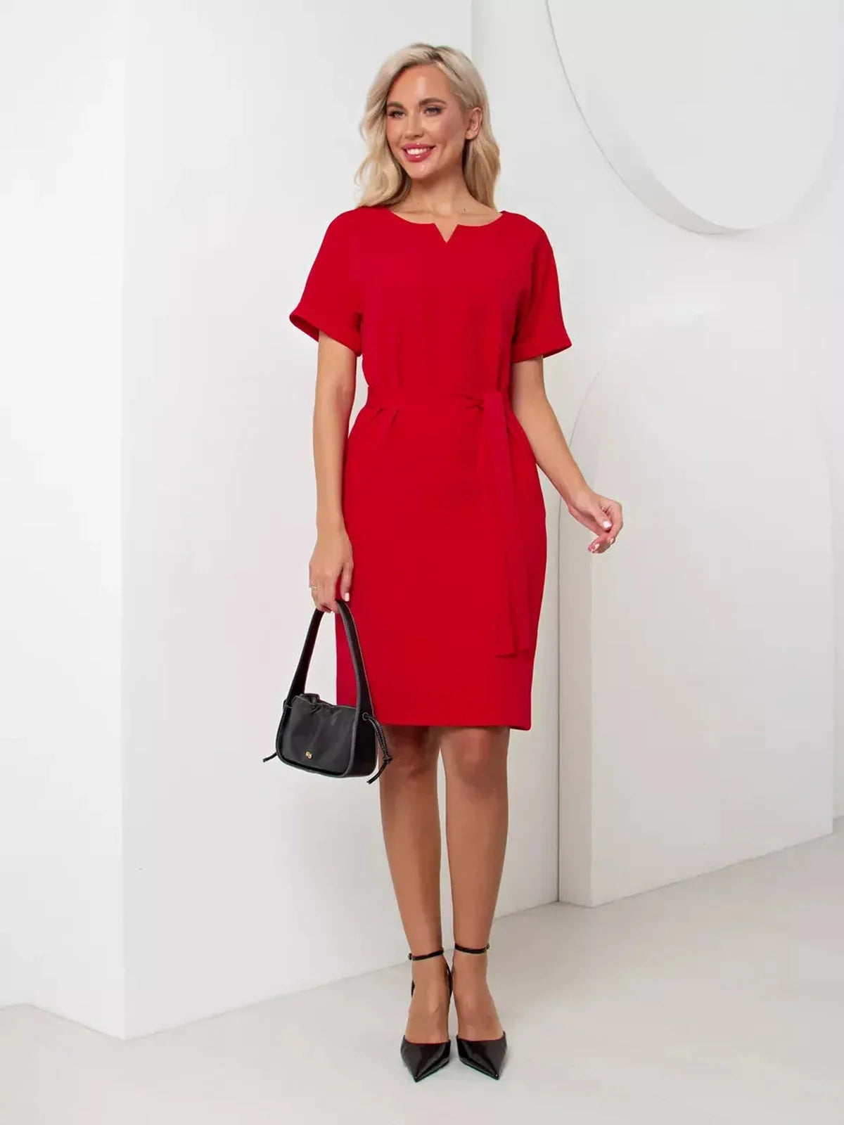 Stylish red mini dress with a flattering silhouette, perfect for weddings or special occasions in women's clothing.