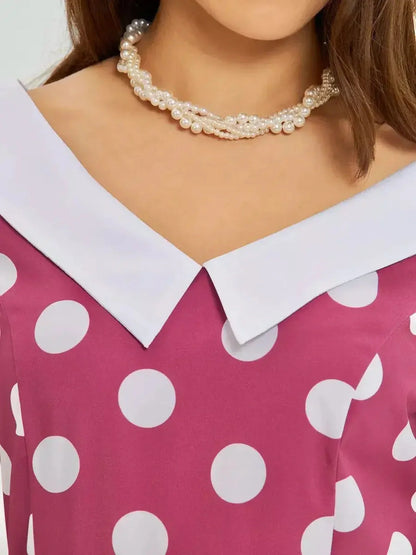 Close-up of the Retro Dot Midi Dress showcasing a white collar and pearl necklace, combining vintage charm and elegance.