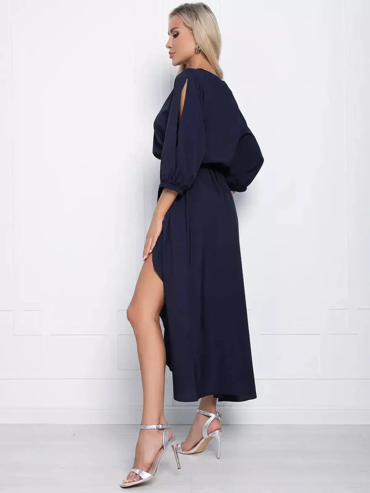 Sapphire Grace Midi Dress in navy with a flowing silhouette and slit sleeves, perfect for weddings and special occasions.