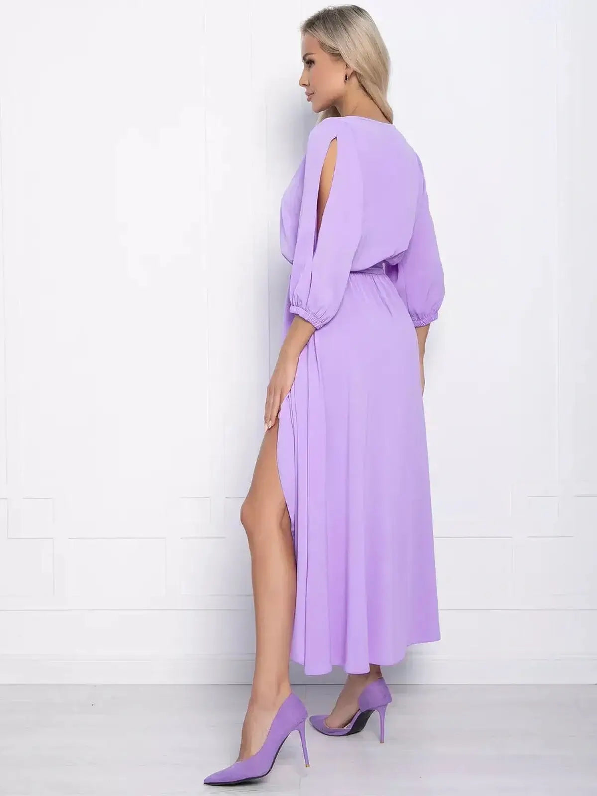 Lilac Glow Midi Dress with shoulder cutouts and high-low hem, styled for summer events and special occasions.