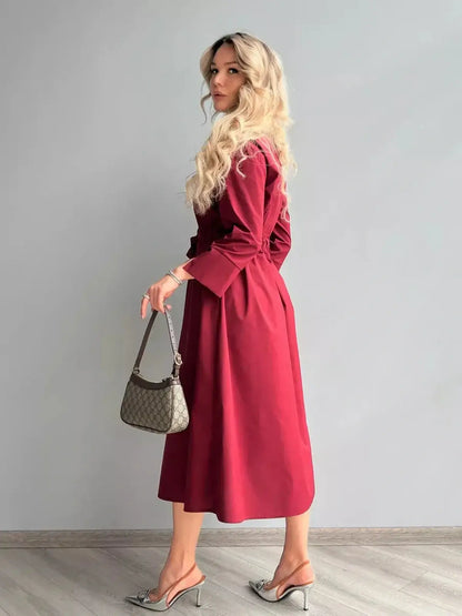 Burgundy Grace Midi Dress showcasing a polished A-line silhouette and stylish tie belt, perfect for weddings and formal occasions.