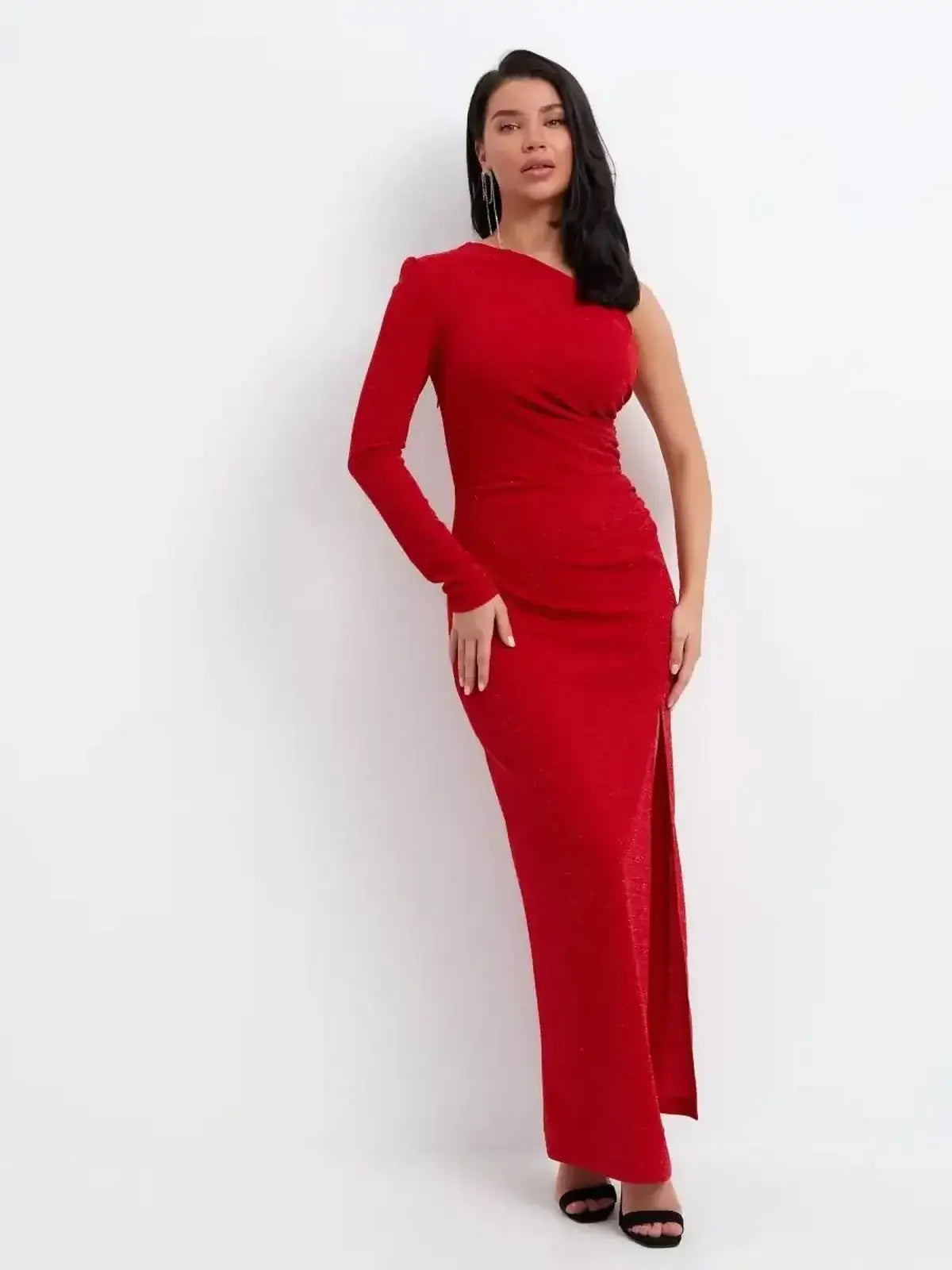 Red one-shoulder maxi dress with thigh-high slit, capturing evening glamour and elegance for formal events.