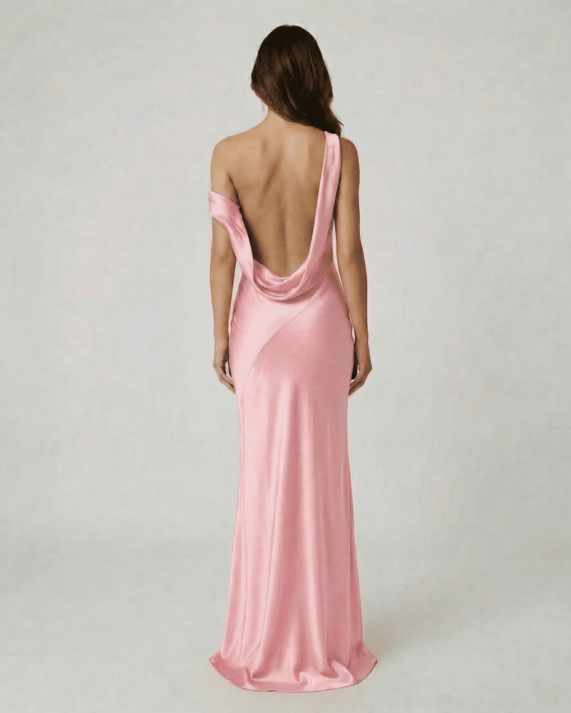 Rosalia Maxi Dress by Slimona, showcasing elegant open back design in soft pink satin-effect fabric.
