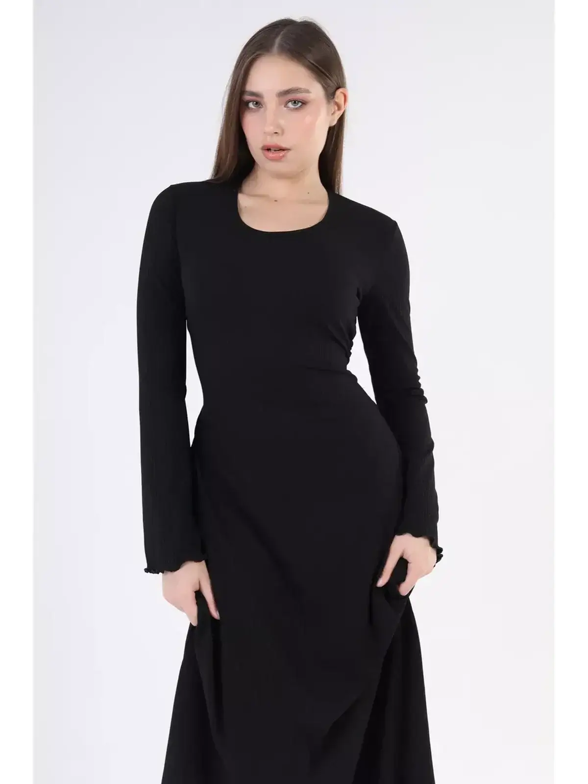 Noir Flare Midi Dress with long sleeves in black, showcasing an elegant silhouette perfect for formal events and weddings.