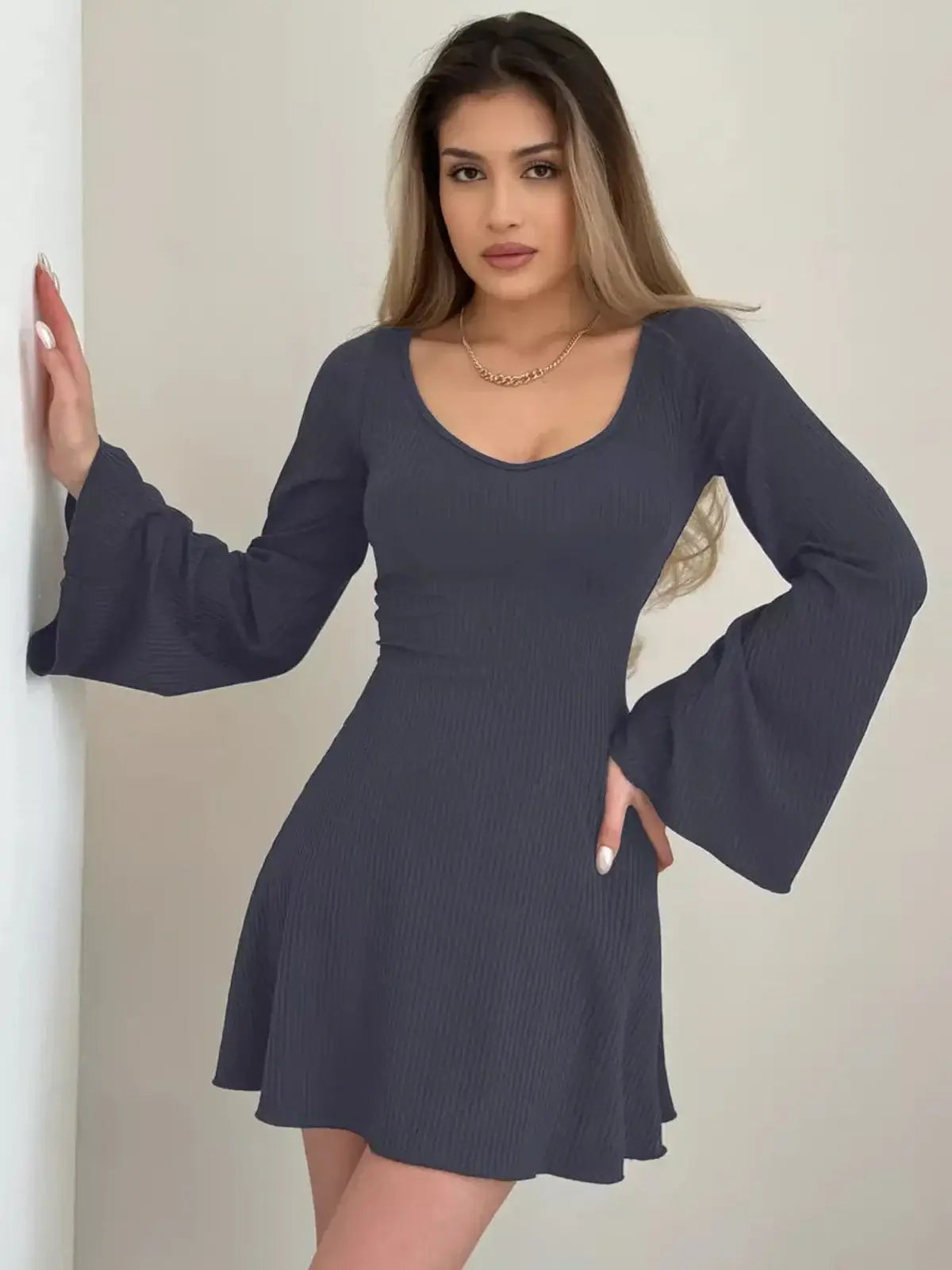 Elegant Noir Flare Midi Dress with dramatic bell sleeves and scoop neckline, perfect for weddings and special occasions.