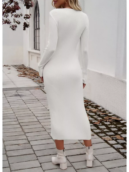Back view of a woman wearing a sleek white Sculpted Charm Midi Dress with long sleeves and a ribbed texture.