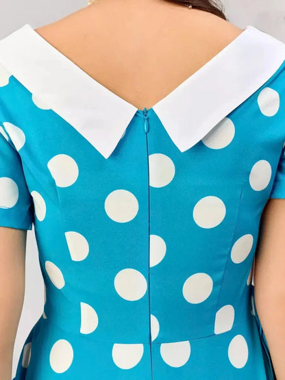 Back view of Retro Charm Midi Dress featuring bold polka dots and a classic white contrast collar, ideal for stylish occasions.