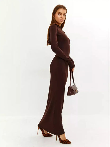 Woman in a sleek brown Sculpt Maxi Dress featuring a hood, perfect for casual and formal occasions.