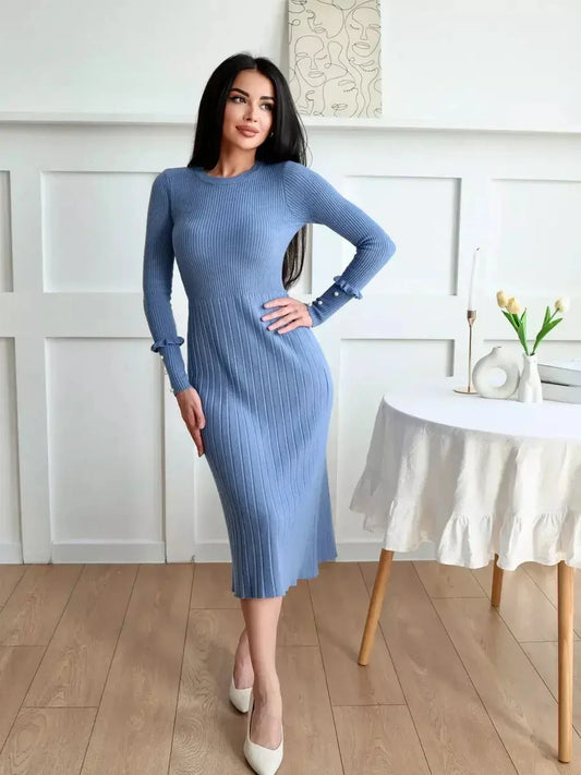 Elegant Serene Lines Midi Dress in blue ribbed knit with pearl cuffs, ideal for weddings and special occasions.