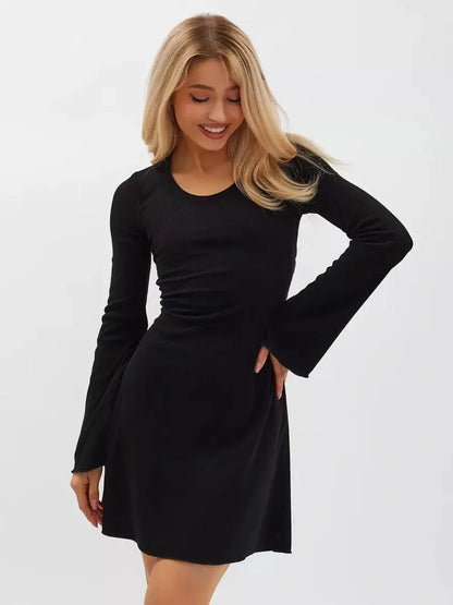 Noir Flare Mini Dress in black, featuring long flared sleeves and a tie waist, ideal for weddings and formal events.