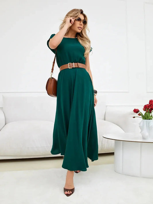 Emerald Aura Maxi Dress in lush green, featuring a cinched waist and soft flow, perfect for summer events and weddings.