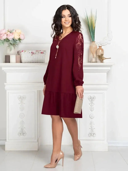 Lace Ruby deep cherry-toned mini dress with sheer lace sleeves, perfect for weddings and formal events.