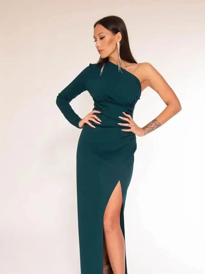 One-shoulder emerald green maxi dress with a side slit, highlighting evening elegance for formal occasions.
