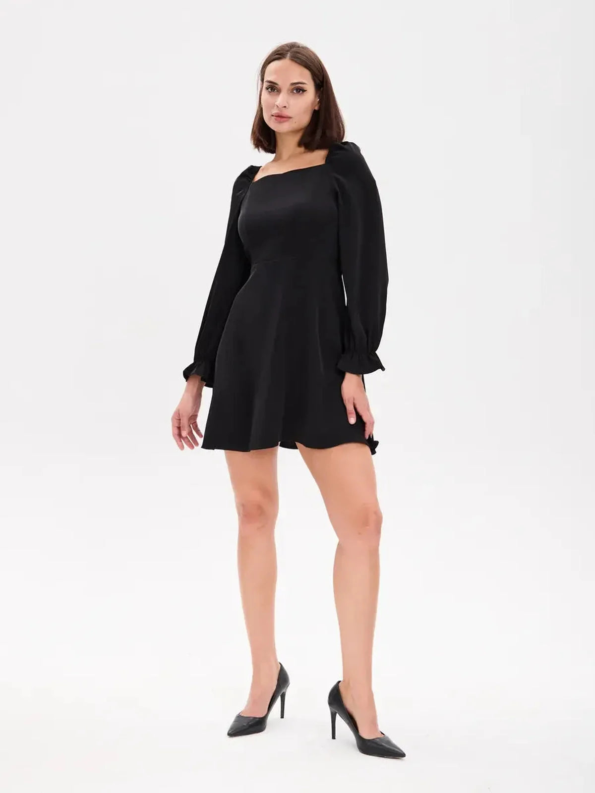Midnight Frame Mini Dress featuring structured sleeves and a square neckline, ideal for formal and elevated occasions.