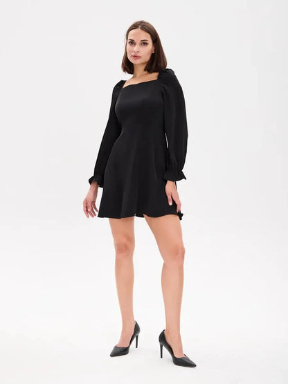 Midnight Frame Mini Dress featuring structured sleeves and a square neckline, ideal for formal and elevated occasions.