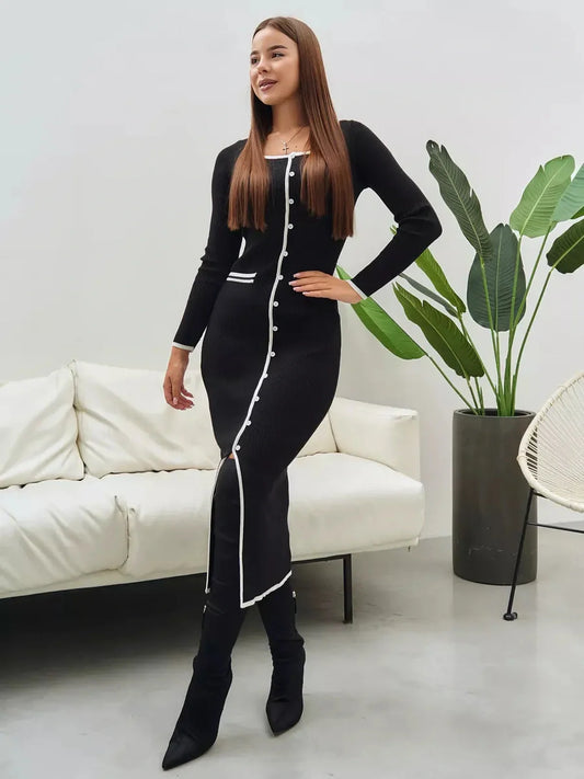 Stylish model in a black contrast button midi dress, perfect for wedding guest, cocktail, and formal occasions.