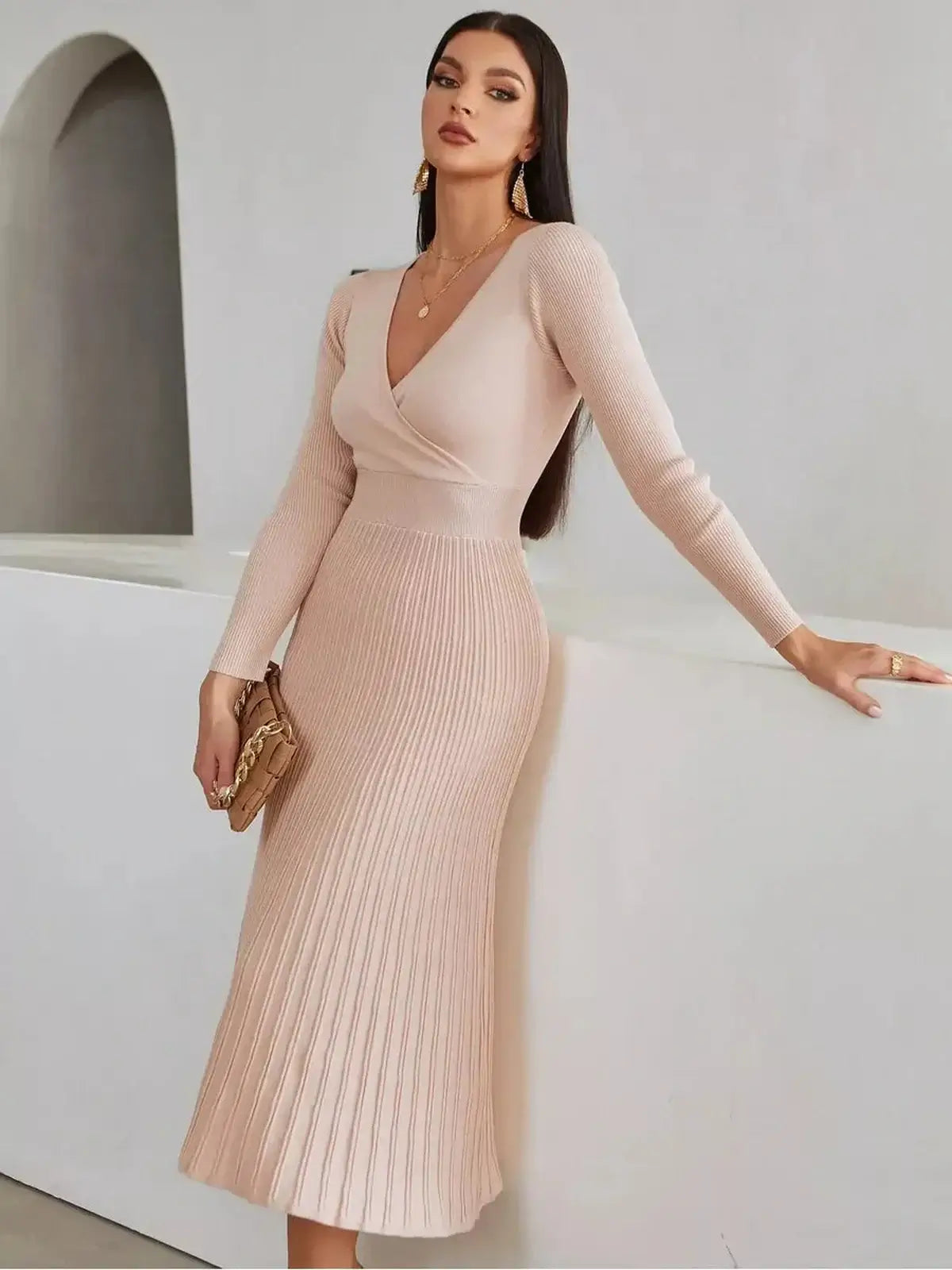 Blush Grace Midi Dress featuring a wrap-effect bodice and pleated skirt, perfect for weddings and elegant occasions.