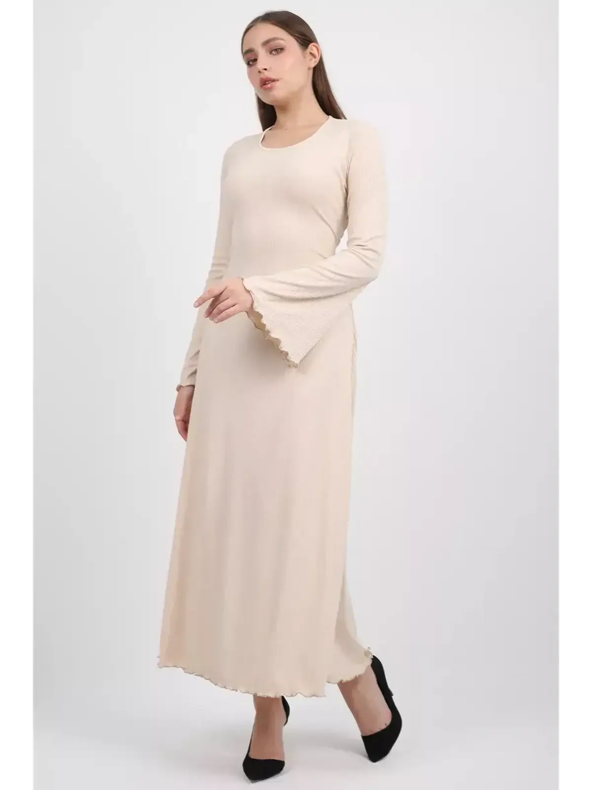 Ivory Flow Midi Dress featuring bell sleeves and a soft ribbed texture, ideal for weddings and special occasions.