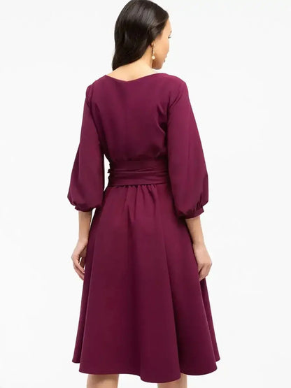 Back view of the Burgundy Allure Midi Dress with balloon sleeves and fitted waist, ideal for weddings and formal occasions.