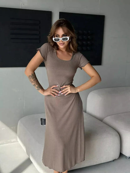 Sleek contour midi dress in ribbed texture, featuring an adjustable lace-up waist for a flattering fit.