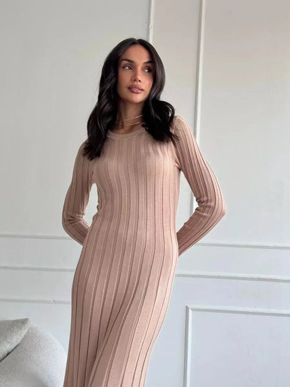 Sahara Curve Maxi Dress in Sandstone Beige, showcasing a sculpted fit with soft ribbed texture, ideal for summer and formal occasions.