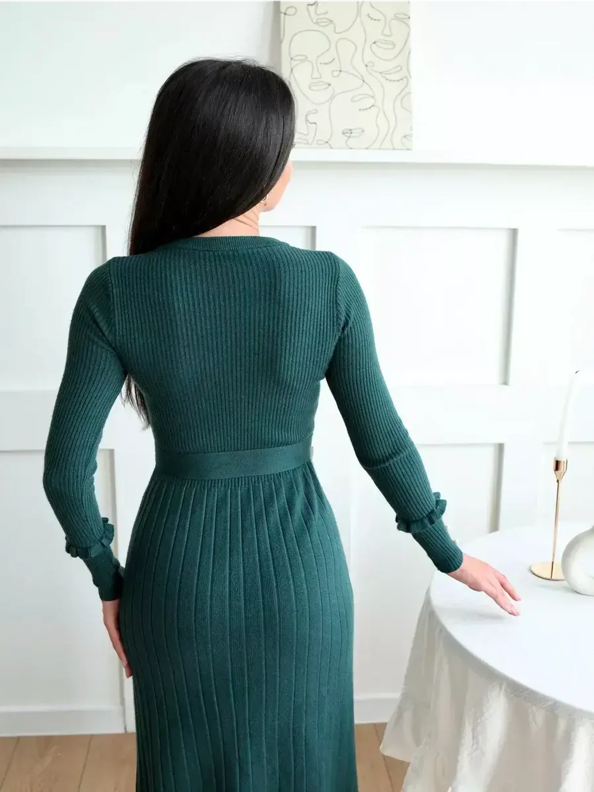 Emerald Grace Midi Dress featuring ribbed knit and pleated textures, showcasing elegant back design.
