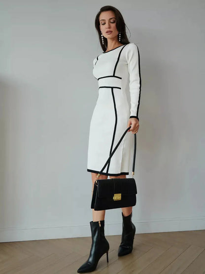 Sculpting Framed Elegance Midi Dress with black piping, perfect for formal events or wedding guest outfits.