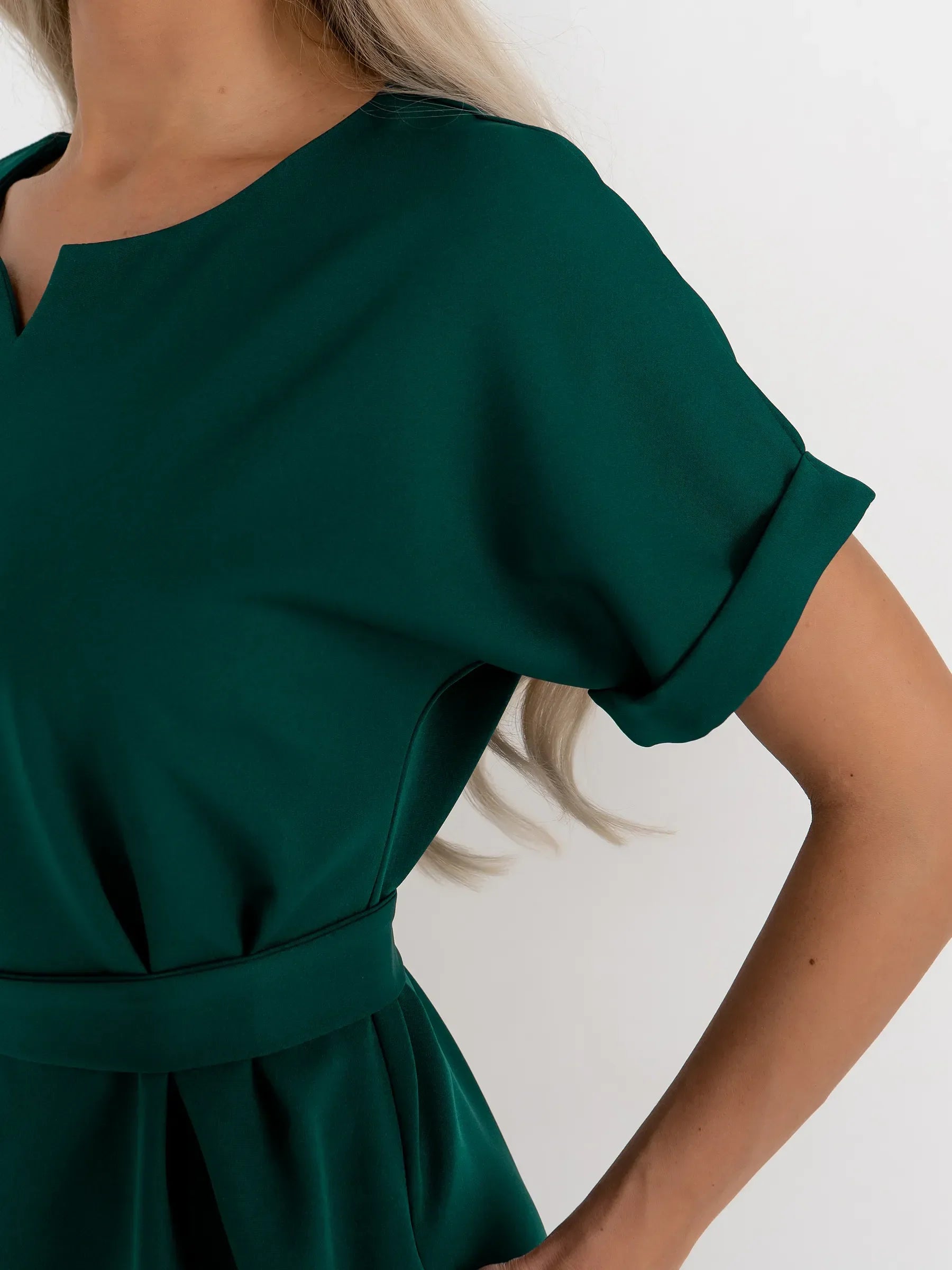 Emerald Mode green mini dress with notched neckline and cuffed sleeves, ideal for weddings, proms, and summer events.