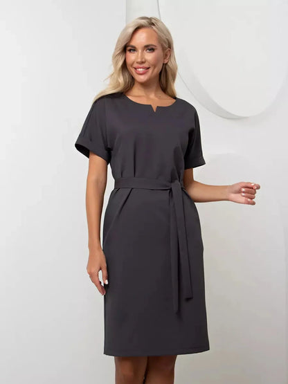 Graphite Edit mini dress featuring short sleeves, waist belt, and soft round neckline. Perfect for weddings and events.