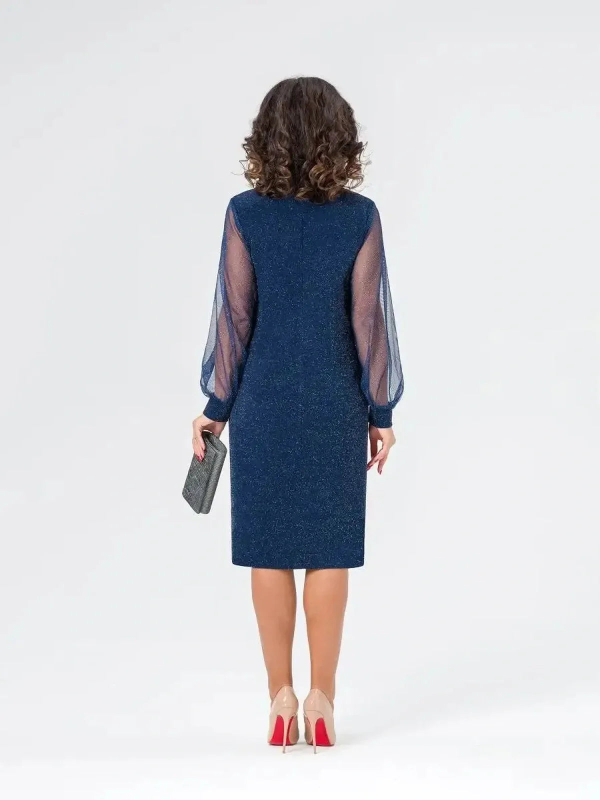 Back view of Celeste Midi Dress with sheer sleeves, shimmery navy fabric, perfect for weddings and formal events.