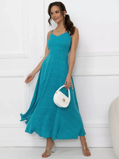 Turquoise Serenity Maxi Dress featuring a fluid A-line silhouette and adjustable straps, perfect for summer events.