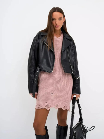 Model wearing Blush Edge Mini dusty pink knit dress with a black leather jacket, ideal for casual chic looks.