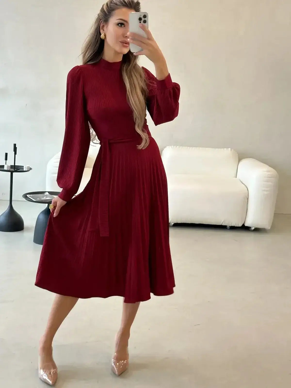 Crimson Grace Midi Dress in rich red with pleated skirt and full sleeves, perfect for formal events and weddings.