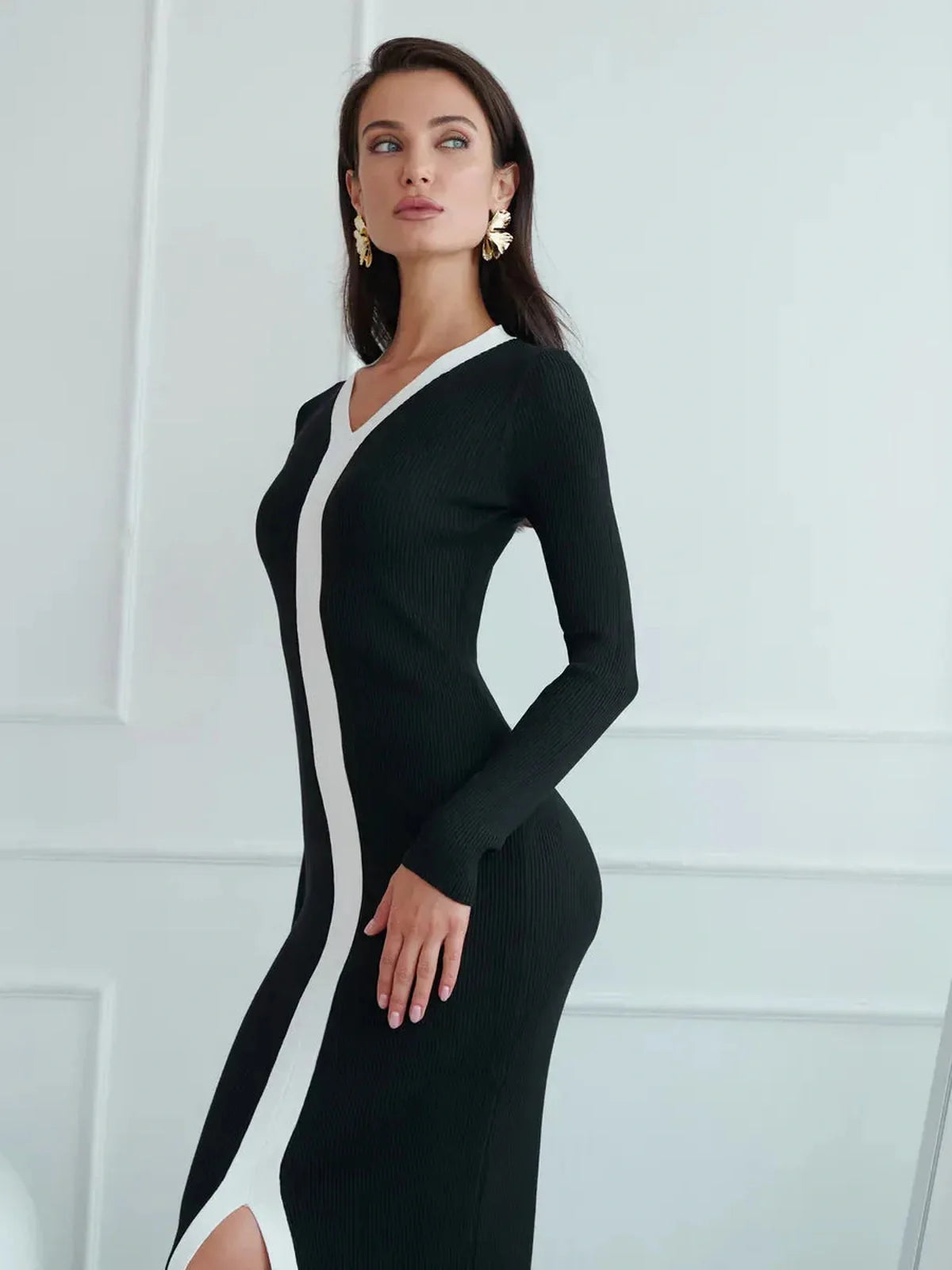 Sleek Contour Line Midi Dress featuring V-neckline and contrast piping, perfect for formal events.