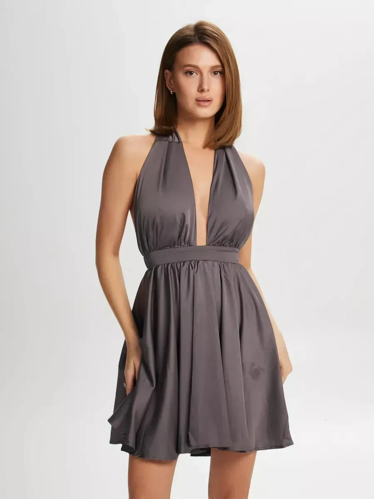 Elegant Satin Whisper mini dress featuring a plunging V-neckline and flattering halter tie-back for women.
