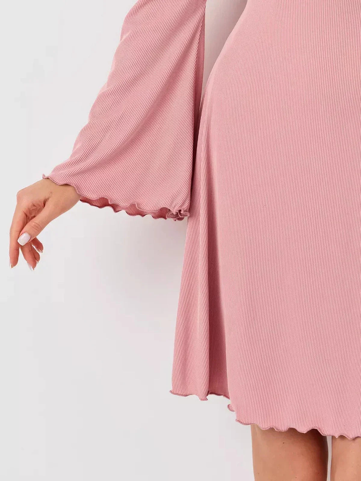 Detail of Blush Whisper pink dress showcasing flared bell sleeves and soft ribbed fabric, perfect for summer or special occasions.